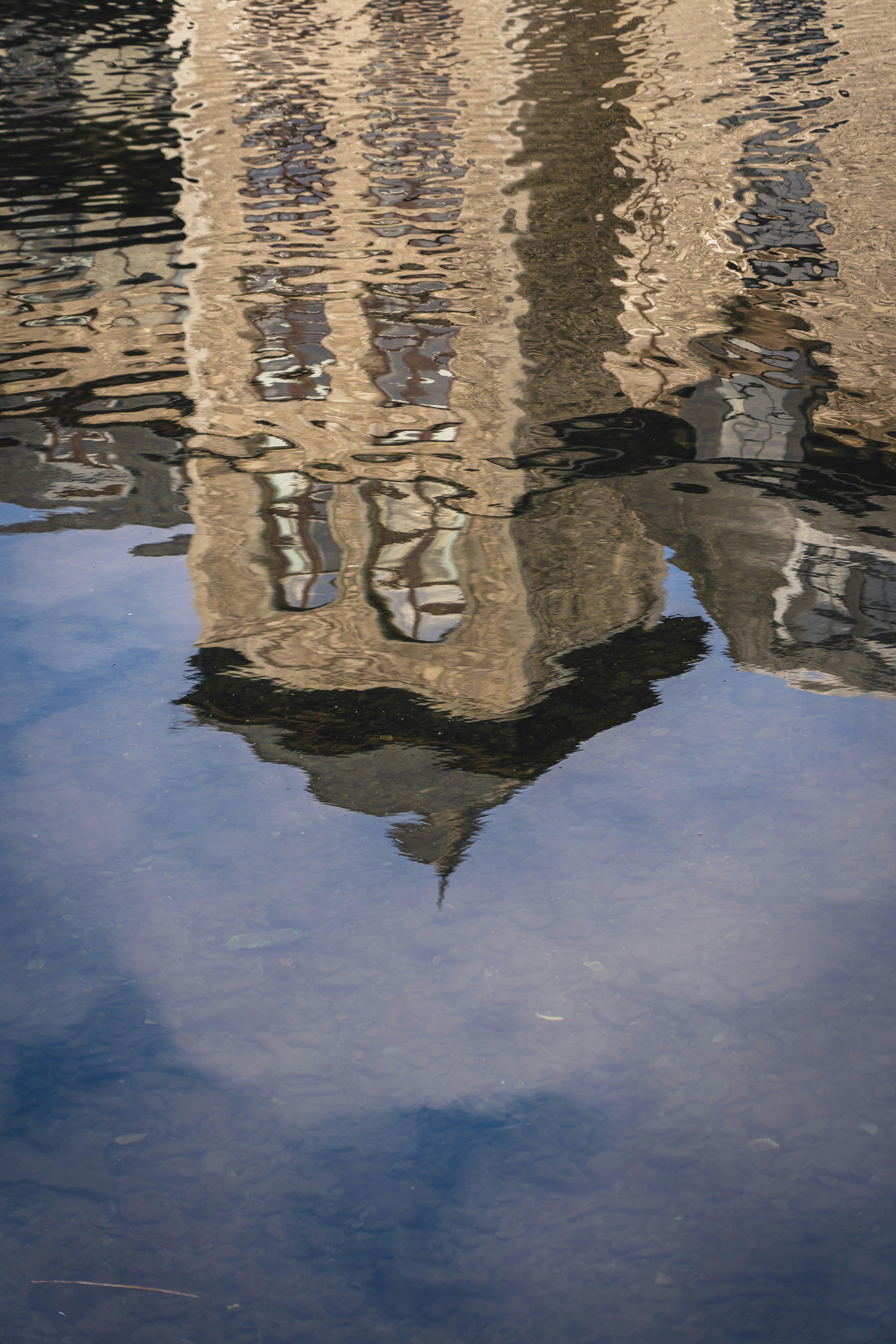 reflection of man in water